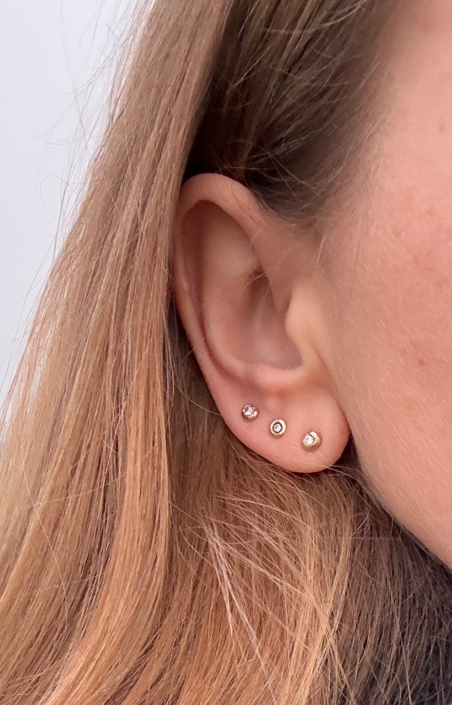 Single Molten Diamond Studs in Yellow or White Gold